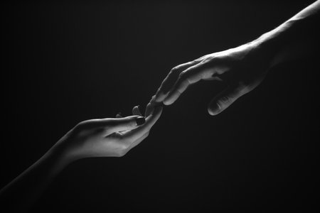 Hands at the time of rescue. Tenderness, tendet touch. Friends greeting, teamwork, friendship. Rescue, helping gesture or hands. Helping hand of a friend. Handshake, arms and friendship.の写真素材