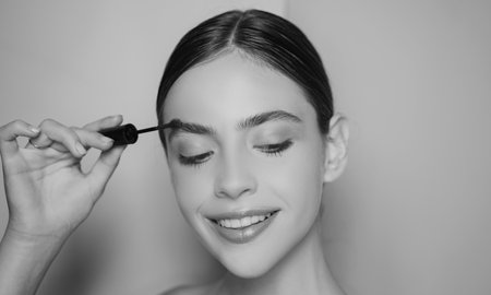 Beautiful thick eyebrows, a vivid glance. Perfect eyebrows, make-up correction.の写真素材