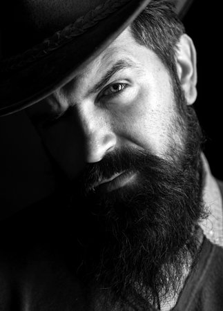 Portrait of cowboy in leather hat. American Western. Wild West Rodeo.の写真素材