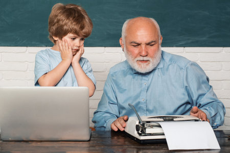 Pupil preparing for test or exam. Man teaches child. Young serious male Pupil studying in school....