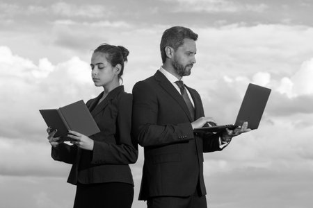 Businessman and businesswomen. Beautiful young business woman and handsome businessman in formal...