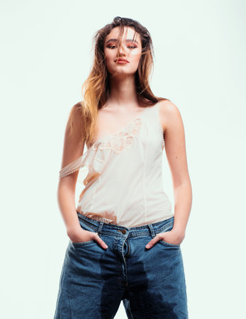 oops. Sexy girl. Sensual woman. arousal and orgasm. Beauty and fashion. wet crotch. sweating. groin, wet pants and incontinence. sexual infections. Health problems and treatment. shabby appearance.の写真素材