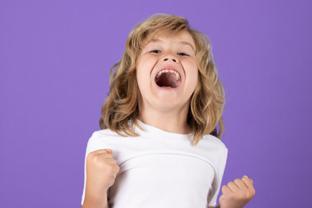 Expression kids face. Excited kid boy on studio isolated background. Surprised face, amazed emotions...