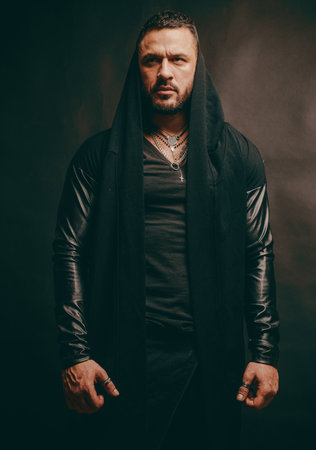 Studio shot of young man looking at the camera. Handsome guy with confident face.の写真素材