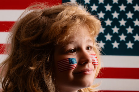American flag on child cheek, independence day 4th of july. United States of America concept. Fourth of july independence day of the usa. Portrait of american patriot child. American patriot.の写真素材
