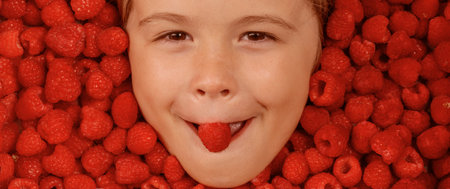 Child face with raspberry frame, close up raspberry background.