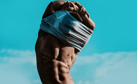 Sexy man with muscular body and bare torso. Muscular shirtless man, attractive guy. Athletic man, fitness model.の写真素材