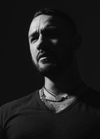 Emotional cry man, upset guy. Pensive man feeling stress. Lonely frustration man.の写真素材