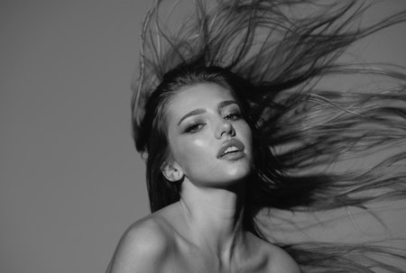 Fashion and beauty. Sensual fashion woman face close up. Beauty portrait of young sexy woman.の写真素材