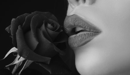 Beautiful woman lips with rose. Lipstick cosmetics makeup, fashion and beauty.
