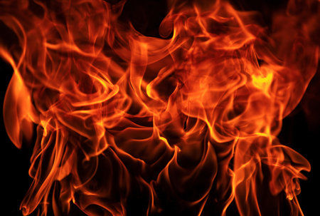 Fire blaze flames on black background. Fire burn flame isolated, abstract texture. Flaming explosion...