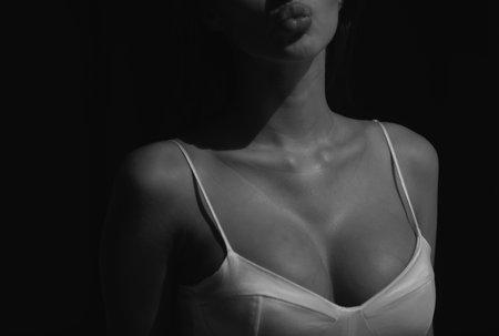 Close up sexy boobs, breast tits. Beautiful woman body, sexy female boobs. Women with large breasts. Naked woman, nude girl, sensual female.の写真素材