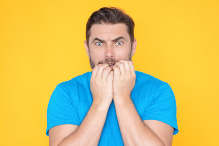 Portrait of shocked amazed excited scared man. Handsome middle age senior man worried, nervous, scared. Afraid scared man. Handsome man scared. Human emotions, facial expression concept.の写真素材