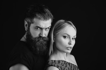 Fashion couple in love. Portrait of passion lovers.