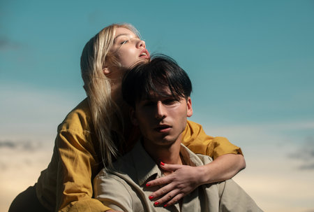 Sensual portrait of young couple in love. Loving couple embracing and kissing.