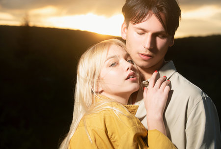 Young lovers hugging and embracing. Tenderness couple touch. Couple in love tenderness and affection.の写真素材