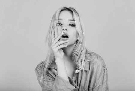 Portrait of young woman. Sensual blonde female model portrait. Young beauty woman face. Sexy look.の写真素材