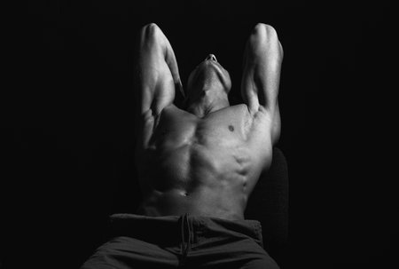 Bare torso of a muscular man. Sexy gay.の写真素材