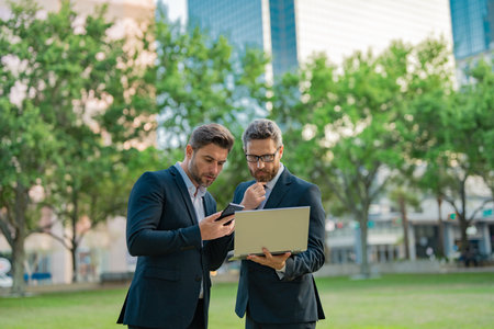 Two business team. Marketing strategy for the two business men team. Business sales strategy was effective in revenue. Branding and advertising were important for the two business teams success.の写真素材