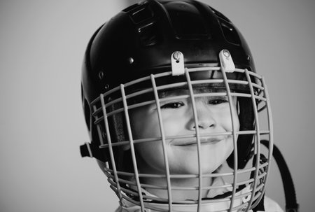 Safety and protection. Protective grid on face. Sport equipment. Hockey or rugby helmet. Sport...