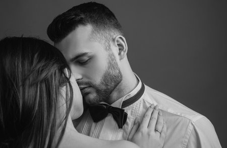 Close-up of beautiful passionate sexy couple kissing. Young girlfriend and boyfriend.の写真素材
