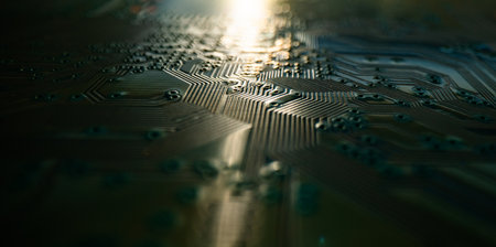 Electronic circuit board technology background. Electronic plate pattern. Circuit board, electrical scheme. Technology background. Electronic microcircuit with microchips and capacitors taken.の写真素材