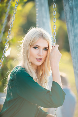 Spring romantic casual woman portrait. Pretty lady enjoying summer outdoors. Positive emotion, relax and calm outside. Beautiful girl outdoor, close up beauty young female face.の写真素材
