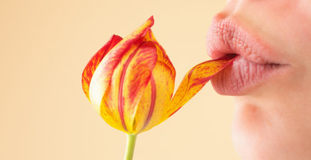 Sexy mouth. Sensual woman lips close up. Tender and seductive. Intimate fantasy. Cosmetic lipgloss. Macro lip. Sexual, passionate and temptation symbol. Erotica, provocative icon. Seductive tongue.の写真素材