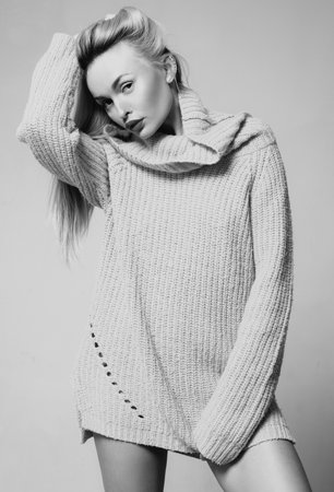 Sensual portrait of elegant young woman in fashionable dress in studio. Beautiful girl fashion model. Elegant Lady.の写真素材