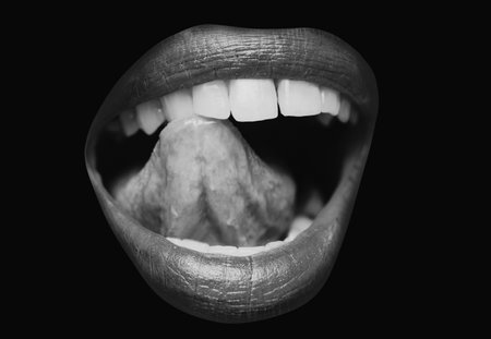 Sensual lips. Sensual open mouth with tongue lick white teeth. Sensual red lips. Sexy lips, suck.の写真素材
