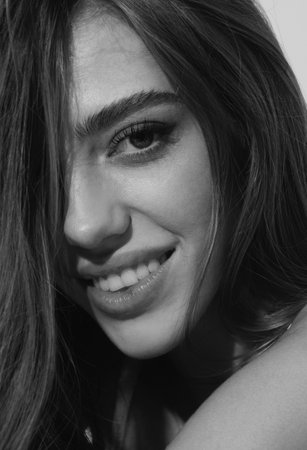 Woman with beauty face, facial portrait. Beautiful tender sensual young girl. Fashion model isolated in studio.の写真素材