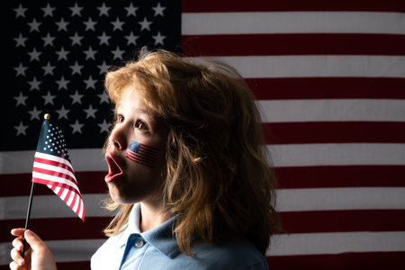 Independence day 4th of july. United States of America and children concept. Fourth of july independence day of the usa. Kid boy with american flag cheek, american patriot, fan.の写真素材