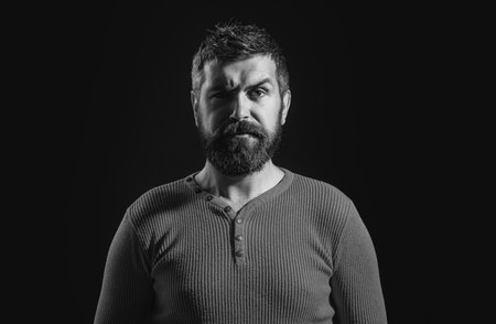 Bearded man. Barber with long beard and moustache in barbershop.の写真素材