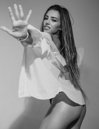 Beautiful and sexy elegant young woman. Sexy female ass.の写真素材