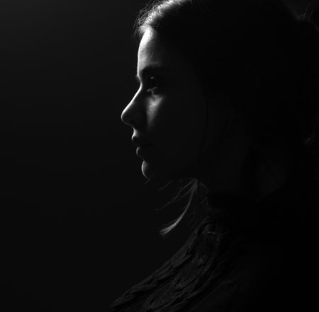 Women profile portrait. Nude makeup. Silhouette girl, side view.の写真素材