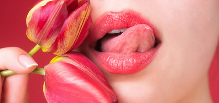 Sexy mouth. Sensual woman lips close up. Tender and seductive. Intimate fantasy. Cosmetic lipgloss....