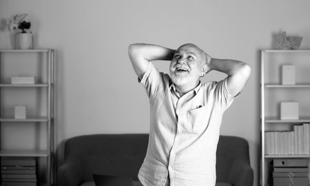 Senior businessman in the office. Successful business concept. Old grandfather teacher.の写真素材