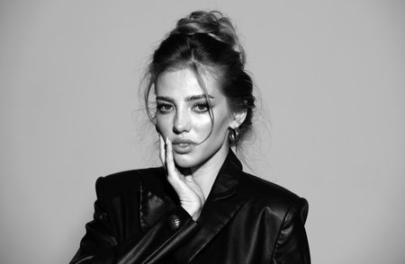 Elegant Lady. Fashion female model portrait. Young beauty woman face.