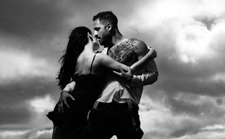 Sexy couple. Passionate sexy moments. Romantic couple in love dating. Man kissing and embracing woman in the tender passion. Latin and hispanic couple.の写真素材