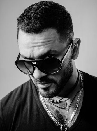 Close up portrait of Handsome young man with sunglasses.
