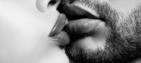 Man with woman kisses. Close up of couple lips wants to kiss.の写真素材