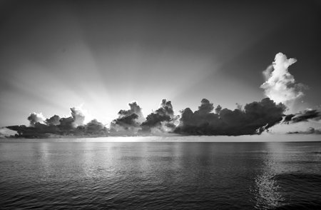 Pacific ocean. Sunset sea landscape. Colorful beach sunrise with calm waves. Nature sea sky. Nature landscape view of beautiful tropical beach. Sunrise with clouds of different colors against sky.の写真素材