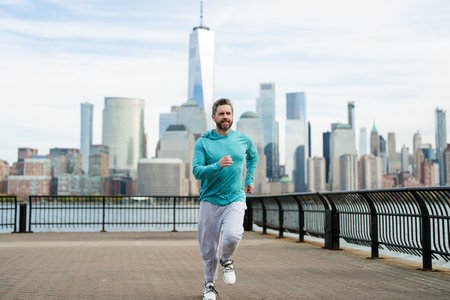 Runner man. Healthy sport. Man running in New York City. Fitness man runner is jogging near...