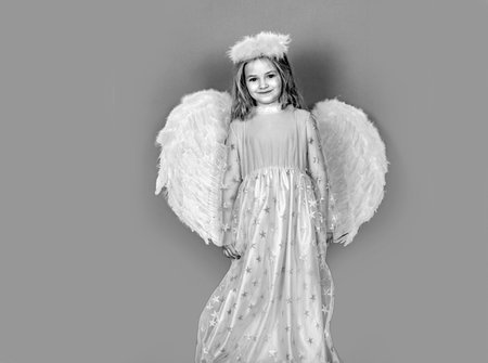 Angel children girl with white wings. Princess kids.の写真素材