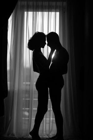 Sexy couple in sensual love. Foreplay and love games of sexy couple. Enjoying pleasure.の写真素材