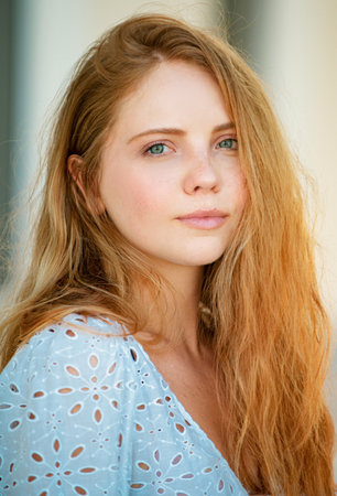 Beautiful young woman posing outdoor. Stylish girl in summer casual outfit. Outdoor female portrait.の写真素材