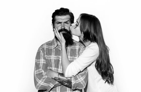 Lovely couple kiss. Happy relationships. Girlfriend kissing boyfriend.の写真素材