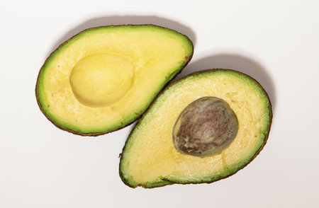 Avocado isolated on white Clipping Path. Professional food photography.の写真素材