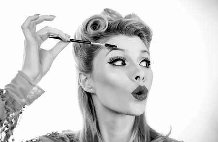 Beautiful thick eyebrows, pin up. Perfect eyebrows, make-up correction. Funny eyebrowの写真素材