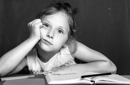 School kids. Hard learning and education kids concept. Back to school. First school day. Schoolkid or preschooler learn.の写真素材